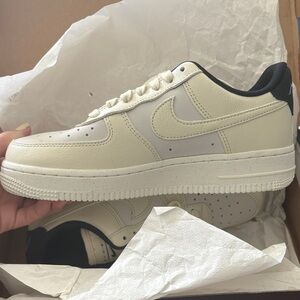 Nike Women’s Cream and Black Sneakers